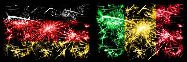 Deutschland, deutsch vs mali Neujahrsfeier reisen funkelnde Feuerwerk Flaggen Konzept Hintergrund. Kombination aus zwei abstrakten Staaten Flaggen. — Stockfoto