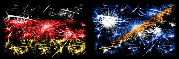 Germany, German vs Marshall Islands New Year celebration travel sparkling fireworks flags concept background. Combination of two abstract states flags. — Stock Photo, Image