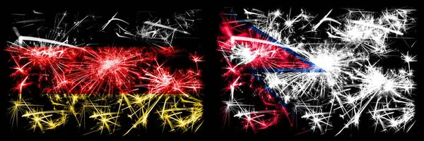 독일, 독일, 네 팔, 네 팔의 새해 기념행사는 불꽃 깃발 컨셉의 배경을 이루고 있다. 두 개의 추상 국가가 결합 된 깃발. — 스톡 사진