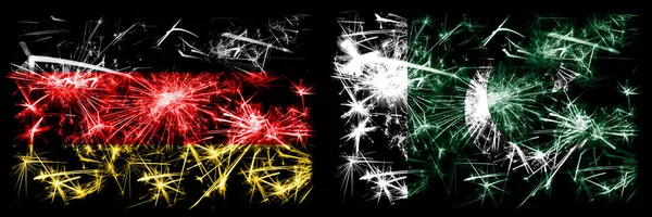 Deutschland, deutsch vs pakistan, pakistanische Neujahrsfeier reisen funkelnde Feuerwerk Flaggen Konzept Hintergrund. Kombination aus zwei abstrakten Staaten Flaggen. — Stockfoto
