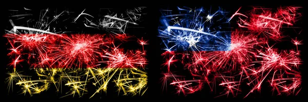 Deutschland, deutsch vs samoa, samoan Neujahrsfeier reisen funkelnde Feuerwerk Flaggen Konzept Hintergrund. Kombination aus zwei abstrakten Staaten Flaggen. — Stockfoto