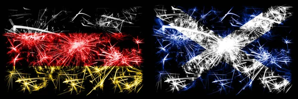 Deutschland, deutsch vs schottisch, schottische Neujahrsfeier reisen funkelnde Feuerwerk Flaggen Konzept Hintergrund. Kombination aus zwei abstrakten Staaten Flaggen. — Stockfoto