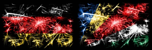 Duitsland, Duits vs Seychellen, Seychelloise Nieuwjaar viering reizen sprankelend vuurwerk vlaggen concept achtergrond. Combinatie van twee abstracte vlaggen. — Stockfoto