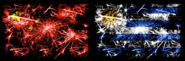 China, Chinese vs Uruguay, Uruguayan New Year celebration travel sparkling fireworks flags concept background. Combination of two abstract states flags.  clipart
