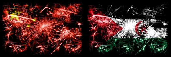 China, China vs Sahrawi Neujahrsfeier Reise funkelnden Feuerwerk Flaggen Konzept Hintergrund. Kombination aus zwei abstrakten Staaten Flaggen. — Stockfoto