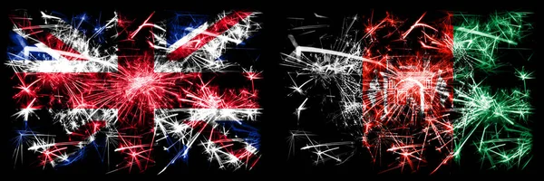 Nagy-Britannia, Egyesült Királyság vs Afganisztán, Afgán Újévi ünneplés utazás pezsgő tűzijáték zászlók koncepció háttér. Két elvont állapot kombinációja zászló. — Stock Fotó