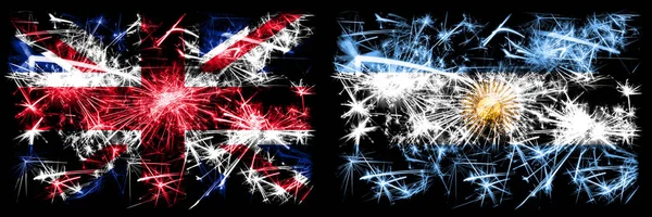 Great Britain, United Kingdom vs Argentina, Argentinian New Year celebration travel sparkling fireworks flags concept background. Combination of two abstract states flags. — Stock Photo, Image