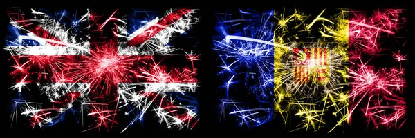 Μεγάλη Βρετανία, Ηνωμένο Βασίλειο εναντίον της Ανδόρας, Andorran Πρωτοχρονιά γιορτή ταξίδια αφρώδη πυροτεχνήματα σημαίες έννοια φόντο. Συνδυασμός δύο αφηρημένων κρατών σημαιών. — Φωτογραφία Αρχείου