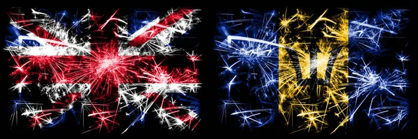 Groot-Brittannië, Verenigd Koninkrijk vs Barbados, Barbadiaanse nieuwjaarsviering reizen sprankelend vuurwerk vlaggen concept achtergrond. Combinatie van twee abstracte vlaggen. — Stockfoto