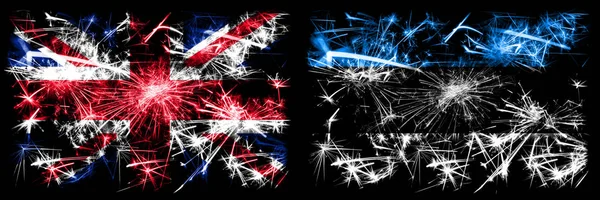 Great Britain, United Kingdom vs Estonia, Estonian New Year celebration travel sparkling fireworks flags concept background. Combination of two abstract states flags. — 스톡 사진