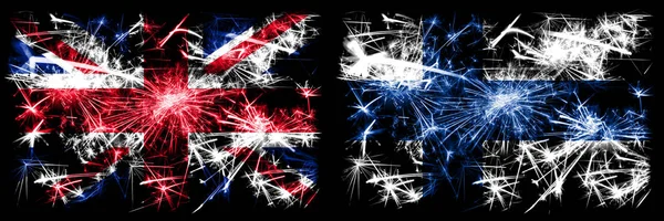 Great Britain, United Kingdom vs Finland, FInnish New Year celebration travel sparkling fireworks flags concept background. Combination of two abstract states flags. — ストック写真