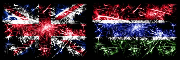 英国，英国对冈比亚，冈比亚新年庆祝旅游闪耀烟花的概念背景。 两种抽象状态标志的组合. — 图库照片