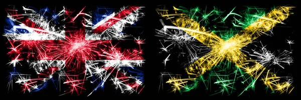 Μεγάλη Βρετανία, Ηνωμένο Βασίλειο εναντίον Τζαμάικα, Τζαμάικα Πρωτοχρονιά γιορτή ταξίδια αφρώδη πυροτεχνήματα σημαίες έννοια φόντο. Συνδυασμός δύο αφηρημένων κρατών σημαιών. — Φωτογραφία Αρχείου
