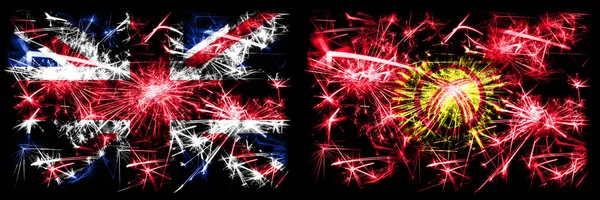 Großbritannien, Vereinigtes Königreich vs Kyrgyzstan Neujahrsfeier Reise funkelnden Feuerwerk Flaggen Konzept Hintergrund. Kombination aus zwei abstrakten Staaten Flaggen. — Stockfoto