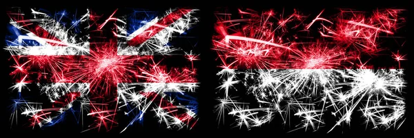 Great Britain, United Kingdom vs Monaco, Monacan New Year celebration travel sparkling fireworks flags concept background. Combination of two abstract states flags. — ストック写真