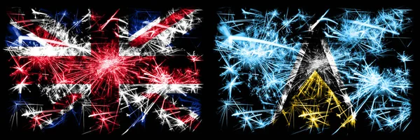 Groot-Brittannië, Verenigd Koninkrijk vs Saint Lucia Nieuwjaarsviering reizen sprankelend vuurwerk vlaggen concept achtergrond. Combinatie van twee abstracte vlaggen. — Stockfoto