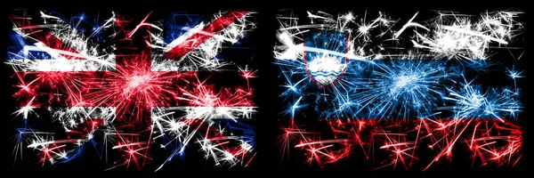 Velká Británie, Spojené království vs Slovinsko, slovinský novoroční oslavy cestování šumivé zábavní pyrotechnika vlajky koncept pozadí. Kombinace dvou abstraktních stavových příznaků. — Stock fotografie