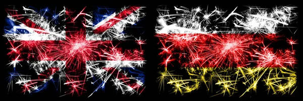 Groot-Brittannië, Verenigd Koninkrijk vs Zuid-Ossetië Nieuwjaar viering reizen sprankelend vuurwerk vlaggen concept achtergrond. Combinatie van twee abstracte vlaggen. — Stockfoto