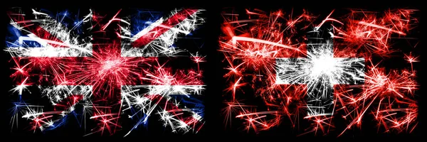 Nagy-Britannia, Egyesült Királyság vs Svájc, Svájc Újévi ünneplés utazás pezsgő tűzijáték zászlók koncepció háttér. Két elvont állapot kombinációja zászló. — Stock Fotó