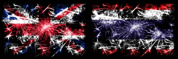 Storbritannien, Storbritannien vs Thailand, thailändskt nyårsfirande resa gnistrande fyrverkerier flaggor koncept bakgrund. Kombination av två abstrakta staters flaggor. — Stockfoto