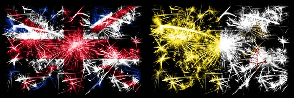 Groot-Brittannië, Verenigd Koninkrijk vs Vaticaanstad Nieuwjaarsviering reizen sprankelend vuurwerk vlaggen concept achtergrond. Combinatie van twee abstracte vlaggen. — Stockfoto