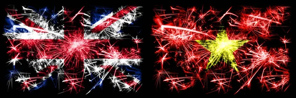 Great Britain, United Kingdom vs Vietnam, Vietnamese New Year celebration travel sparkling fireworks flags concept background. Combination of two abstract states flags. — Stock Photo, Image