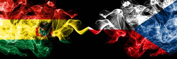 Bolivia, Bolivian vs Czech Republic smoky mystic states flags placed side by side. Concept and idea thick colored silky abstract smoke flags