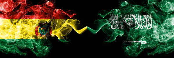 Bolivien, bolivian vs saudi arabia, arabian smoke mystic states flags side by side platziert. Konzept und Idee dicke farbige seidig abstrakte Rauchfahnen — Stockfoto