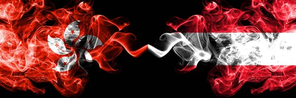 Hong Kong, China vs Austria, Austrian smoky mystic states flags placed side by side. Concept and idea thick colored silky abstract smoke flags — Stock Photo, Image