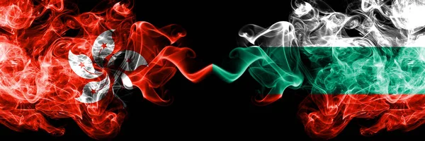 Hongkong, Kina mot Bulgarien, bulgariska rökiga mystiska stater flaggor placerade sida vid sida. Begreppet och idé tjock färgad silkeslen abstrakt rök flaggor — Stockfoto