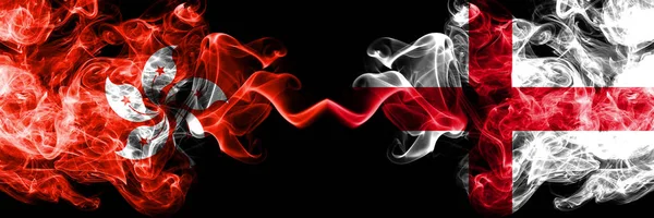 Hong Kong, China vs England, English smoky mystic states flags placed side by side. Concept and idea thick colored silky abstract smoke flags — Stock Photo, Image