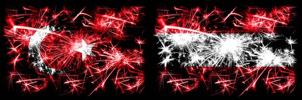 Turecko, turecké vs Rakousko, rakouské silvestrovské oslavy jiskřivé ohňostroje vlajky koncept pozadí. Kombinace dvou abstraktních stavových příznaků. — Stock fotografie