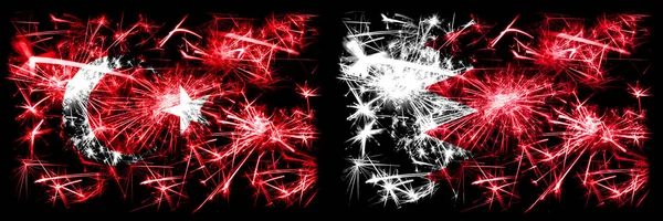 Turecko, turecké vs Bahrajn, Bahrani Nový rok oslavy jiskřivé ohňostroje vlajky koncept pozadí. Kombinace dvou abstraktních stavových příznaků. — Stock fotografie