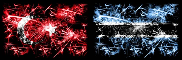 Turecko, turecká vs Botswana, Botswanská novoroční oslava jiskřící ohňostroj vlajky koncept pozadí. Kombinace dvou abstraktních stavových příznaků. — Stock fotografie