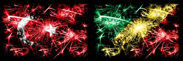 Turkey, Turkish vs Congo, Congolese New Year celebration sparkling fireworks flags concept background. Combination of two abstract states flags. — Stock Photo, Image