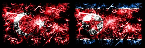 Turkey, Turkish vs North Korea, Korean New Year celebration sparkling fireworks flags concept background. Combination of two abstract states flags. — 图库照片