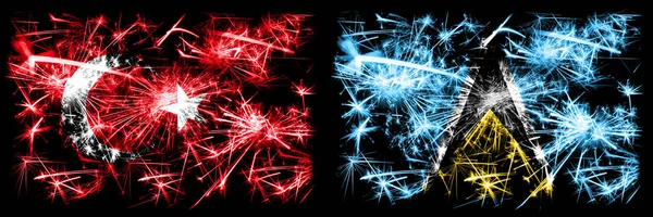 Turkey, Turkish vs Saint Lucia New Year celebration sparkling fireworks flags concept background. Combination of two abstract states flags. — Stock Photo, Image