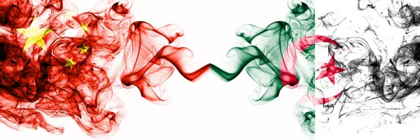 China, Chinese vs Algeria, Algerian smoky mystic states flags placed side by side. Concept and idea thick colored silky abstract smoke flags — Stock Photo, Image