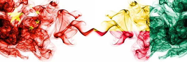 China, Chinese vs Benin, Beninese smoky mystic states flags placed side by side. Concept and idea thick colored silky abstract smoke flags — ストック写真