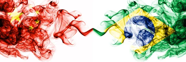 China, Chinese vs Brazil, Brazilian smoky mystic states flags placed side by side. Concept and idea thick colored silky abstract smoke flags — Stock Photo, Image