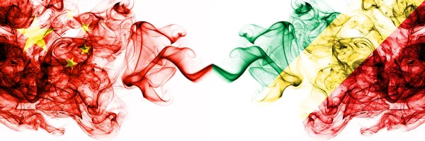 China, Chinese vs Congo, Congolese smoky mystic states flags placed side by side. Concept and idea thick colored silky abstract smoke flags — Stock Photo, Image