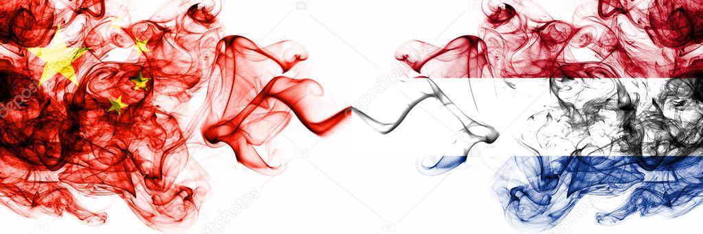 China, Chinese vs Netherlands, Dutch smoky mystic states flags placed side by side. Concept and idea thick colored silky abstract smoke flags