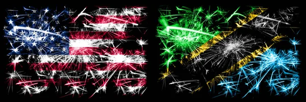 Vereinigte Staaten von Amerika, USA vs Tansania, tansanische Neujahrsfeier funkelnden Feuerwerk Flaggen Konzept Hintergrund. Kombination aus zwei abstrakten Staaten Flaggen. — Stockfoto