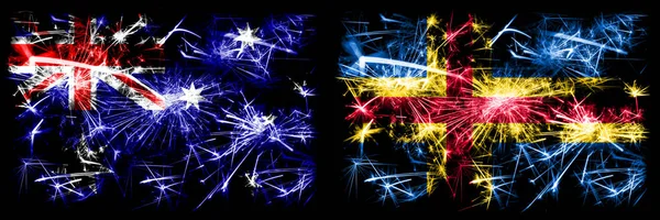 澳大利亚，Ozzie对Aland新年庆祝闪耀的烟花旗帜概念背景。 两种抽象状态标志的组合. — 图库照片