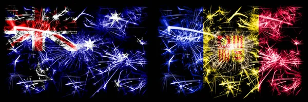 Australien, ozzie vs andorra, andorran Neujahrsfeier funkelnden Feuerwerk Flaggen Konzept Hintergrund. Kombination aus zwei abstrakten Staaten Flaggen. — Stockfoto