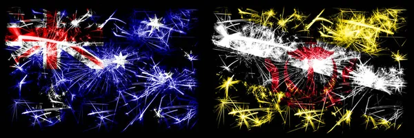 Australien, ozzie vs brunei, bruneian Neujahrsfeier funkelnden Feuerwerk Flaggen Konzept Hintergrund. Kombination aus zwei abstrakten Staaten Flaggen. — Stockfoto