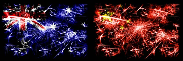 Australia, Ozzie vs China, celebración del Año Nuevo Chino brillante banderas de fuegos artificiales concepto de fondo. Combinación de dos banderas de estados abstractos . — Foto de Stock