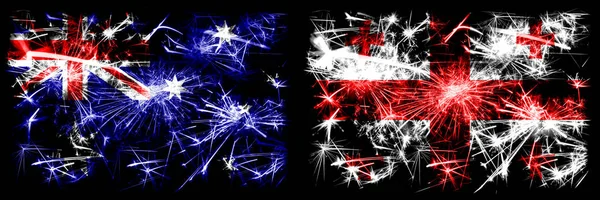 Australien, ozzie vs georgia, georgische Neujahrsfeier funkelnden Feuerwerk Flaggen Konzept Hintergrund. Kombination aus zwei abstrakten Staaten Flaggen. — Stockfoto