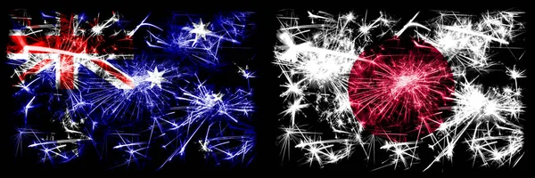 호주, 오지 vs 일본, 일본 새해 축하 불꽃놀이 컨셉트 배경. 두 개의 추상 국가가 결합 된 깃발. — 스톡 사진