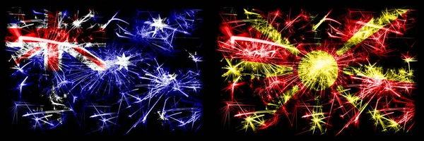 Australien, Ozzie vs Mazedonien, mazedonische Neujahrsfeier funkelnden Feuerwerk Flaggen Konzept Hintergrund. Kombination aus zwei abstrakten Staaten Flaggen. — Stockfoto